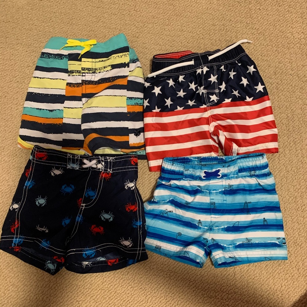 Bundle of 12 mo swim trunks for baby boy